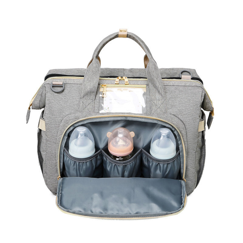 Sac à langer multifonction – avec berceau pliable et compartiments de rangement