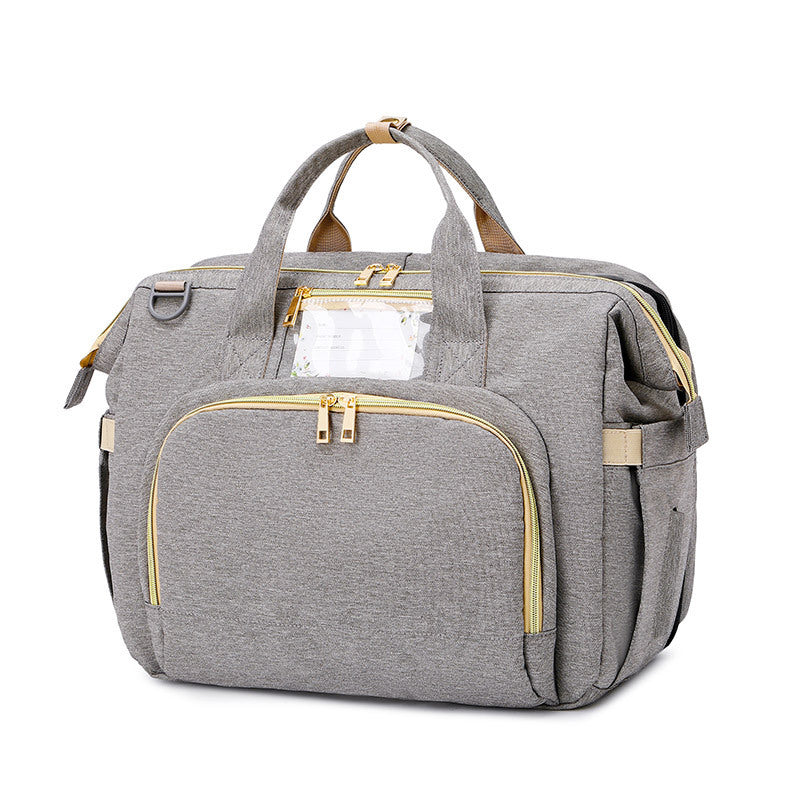 Sac à langer multifonction – avec berceau pliable et compartiments de rangement