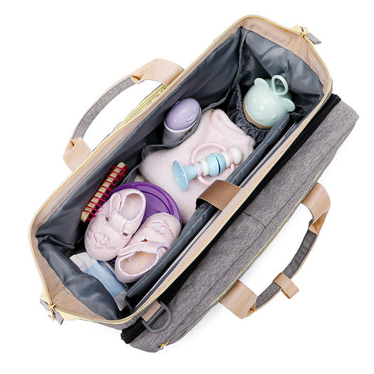 Sac à langer multifonction – avec berceau pliable et compartiments de rangement